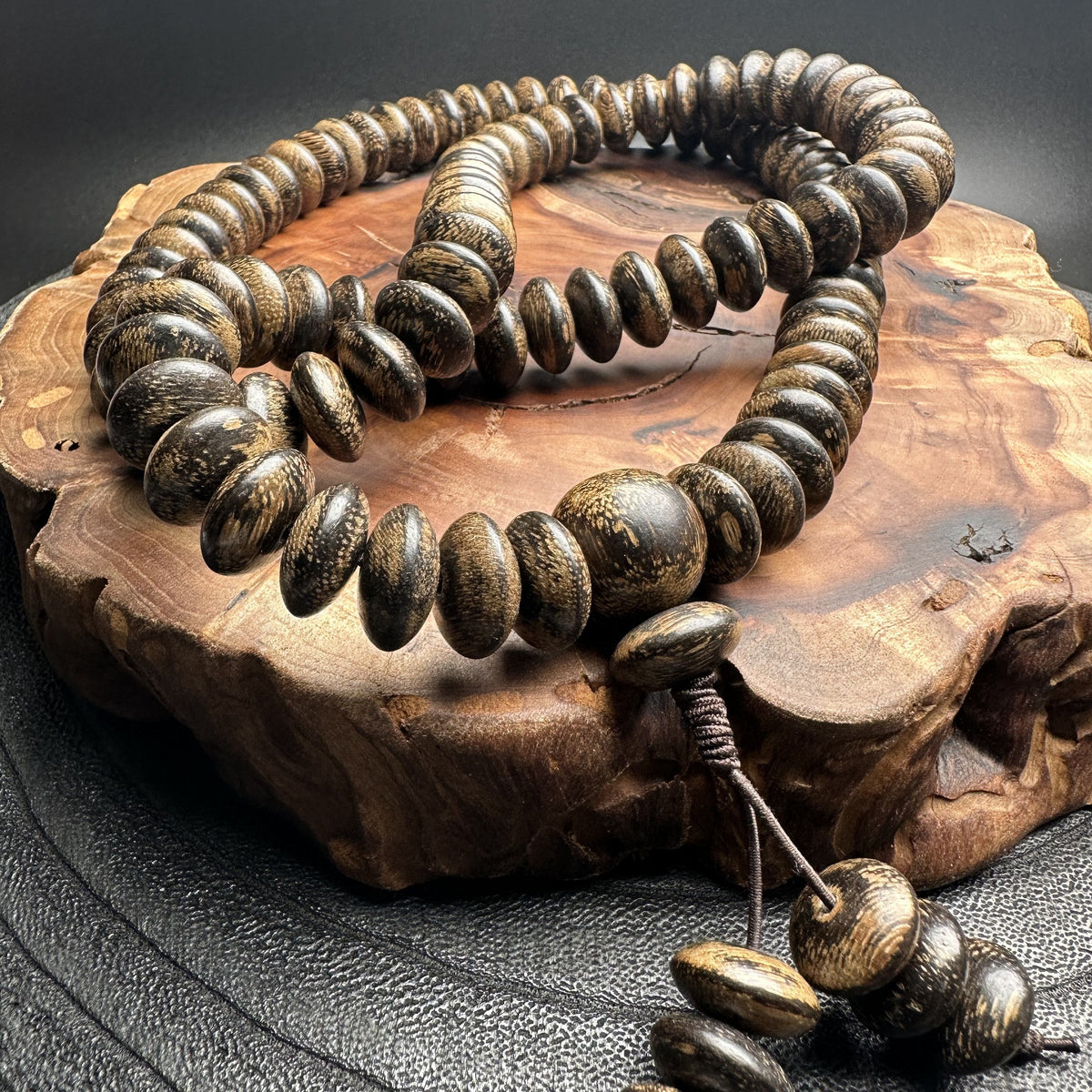 The Riverstone Agar Wood Disc Mala
