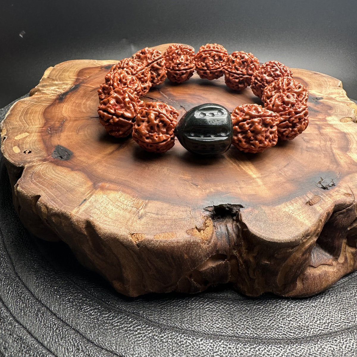 The Yin-Yang Encounter Peach Seed & Black Hetian Jade Bracelet